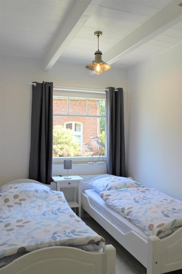 Apartamento Tant Berta'S Huus Krummhörn Exterior foto